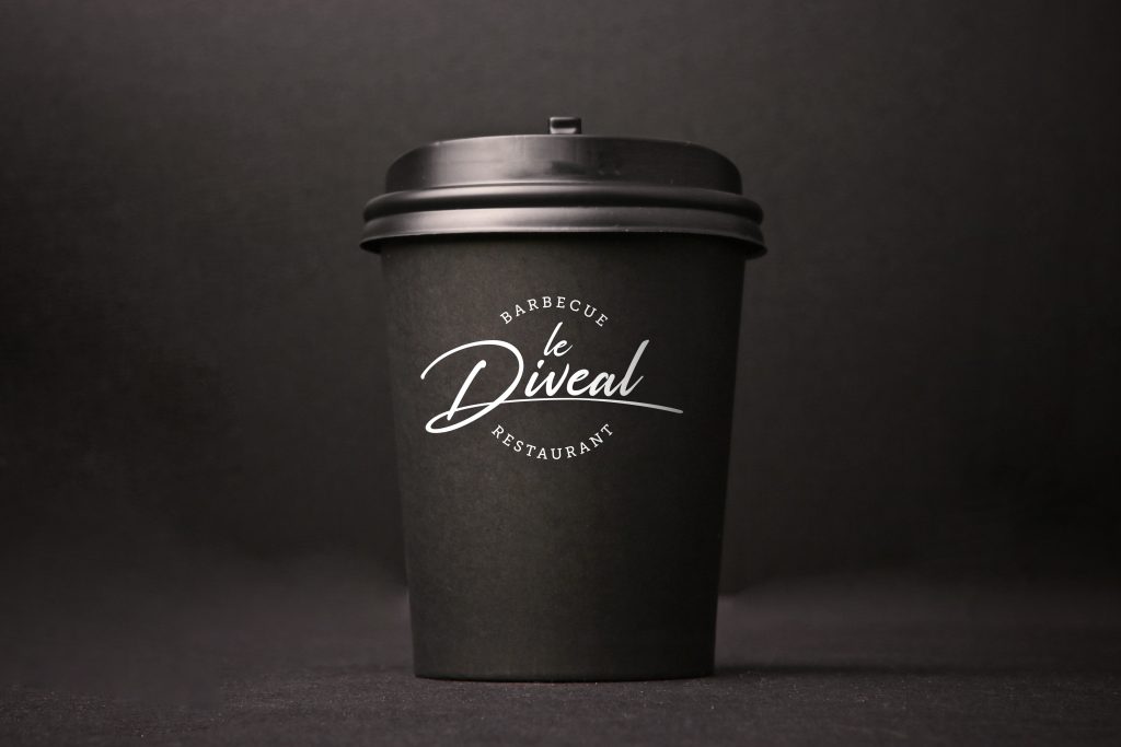 Black background takeaway coffee cup